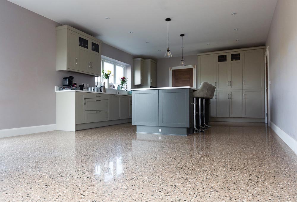 Custom polished concrete floor in a modern Irish kitchen by FBS Flooring