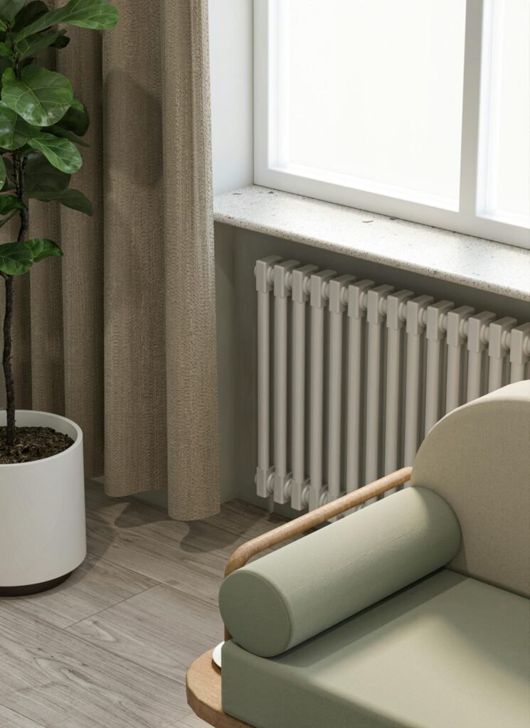 Radiator in a living room above flooring edge area