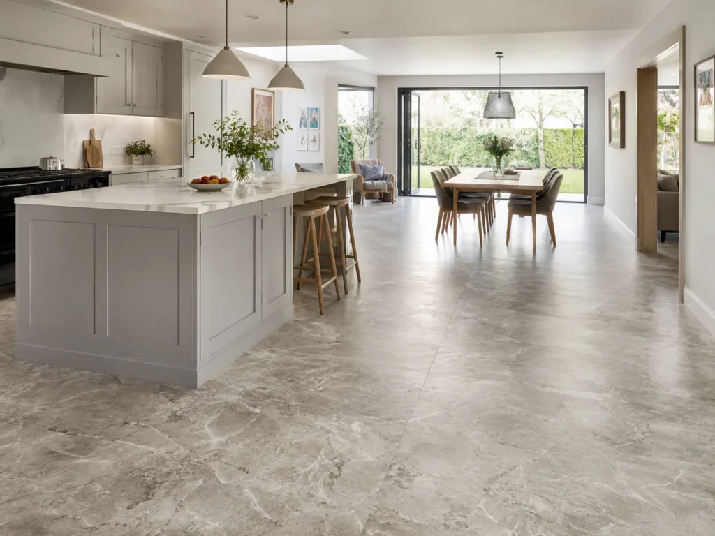 Open-plan Irish kitchen-diner with stone-effect flooring throughout